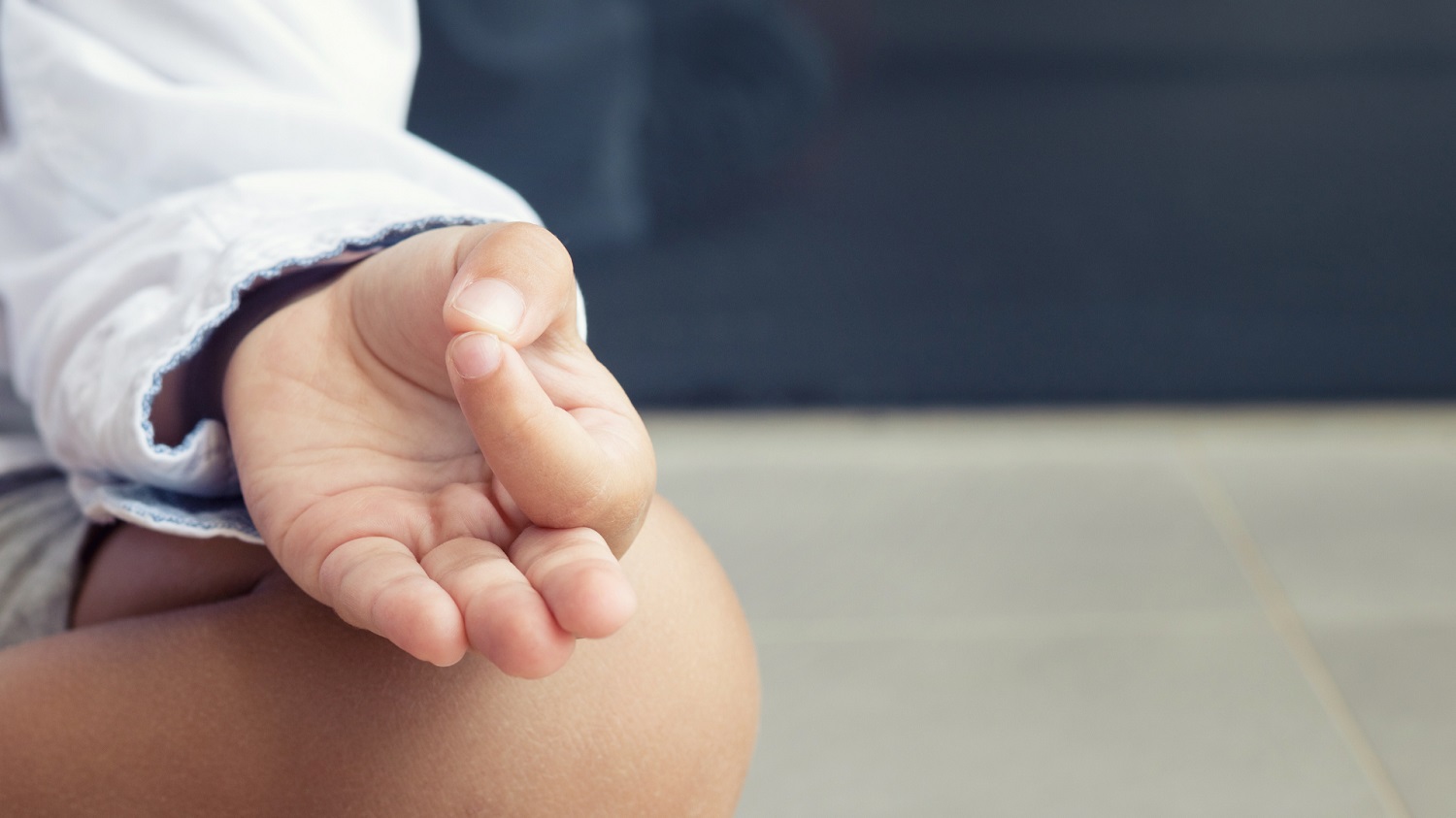 Child meditating|Child in a yoga pose|