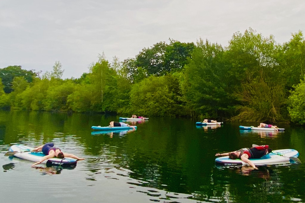 SUP Yoga|Downward Dog on a paddleboard