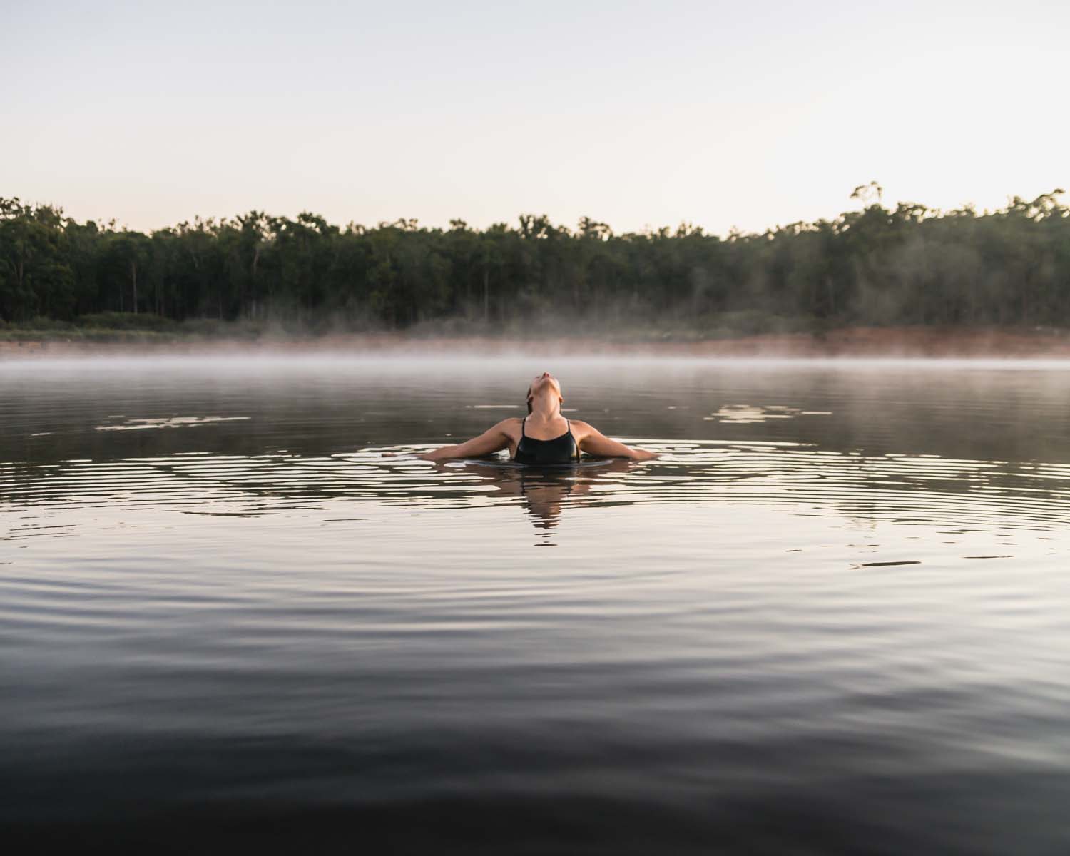 Woman swimming in cold water|Winter swimming